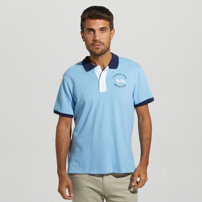 Polo azul marino piqué con tapeta de tres botones y logo bordado en  contraste