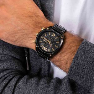 Reloj Diesel Overflow DZ4504 Para Hombre Cronómetro Fecha Acero Inoxidable Negro Dorado