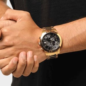 Reloj Guess Atlas W0668G8 Para Hombre Fecha Cronómetro Acero Inoxidable Dorado Negro
