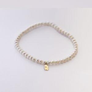 Pulsera de perlas de río en Oro 18K niña