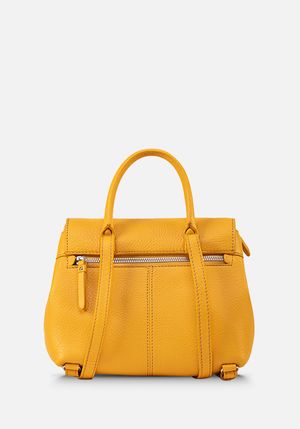 MOCHILA PEQUEÑA COLECCIÓN CAPSULA 73 MUSTARD