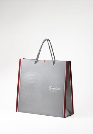 MORRAL DE ESTILO CASUAL EN CUERO GRABADO