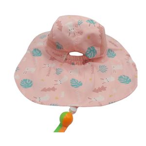 Sombrero con silbato anaranjado con verde y diseño de conejitos