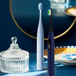 Cepillo eléctrico F1  travel suit -Celeste