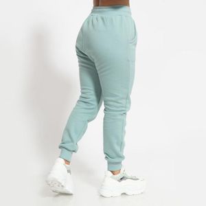 Conjunto mujer buzo afranelado polera y jogger turquesa Arcoi