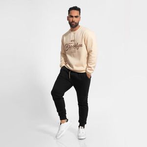 conjunto buzo algodón polera beige y jogger negro brooklyn Arcoi