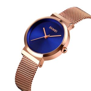 RELOJ SKMEI 1595 ORO ROSA FONDO AZUL CORREA ACERO PARA MUJER.