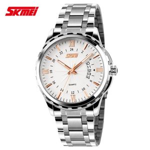 Reloj Skmei 9069 Plateado detalles oro rosa